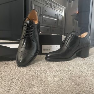 The office of Angela Scott miss button mid heel